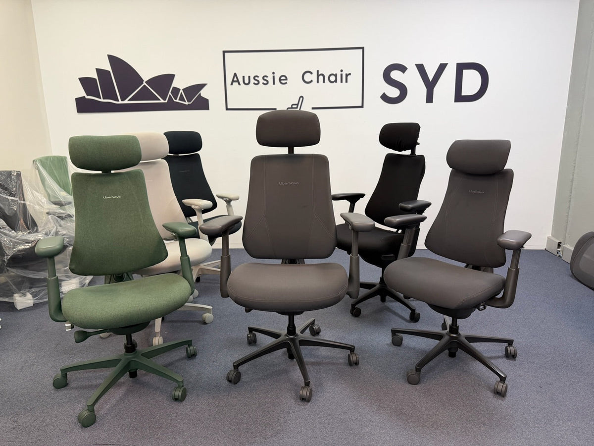 Five LiberNovo chairs lined up in the Aussie Chair Sydney showroom, with the LiberNovo Maxis in the centre