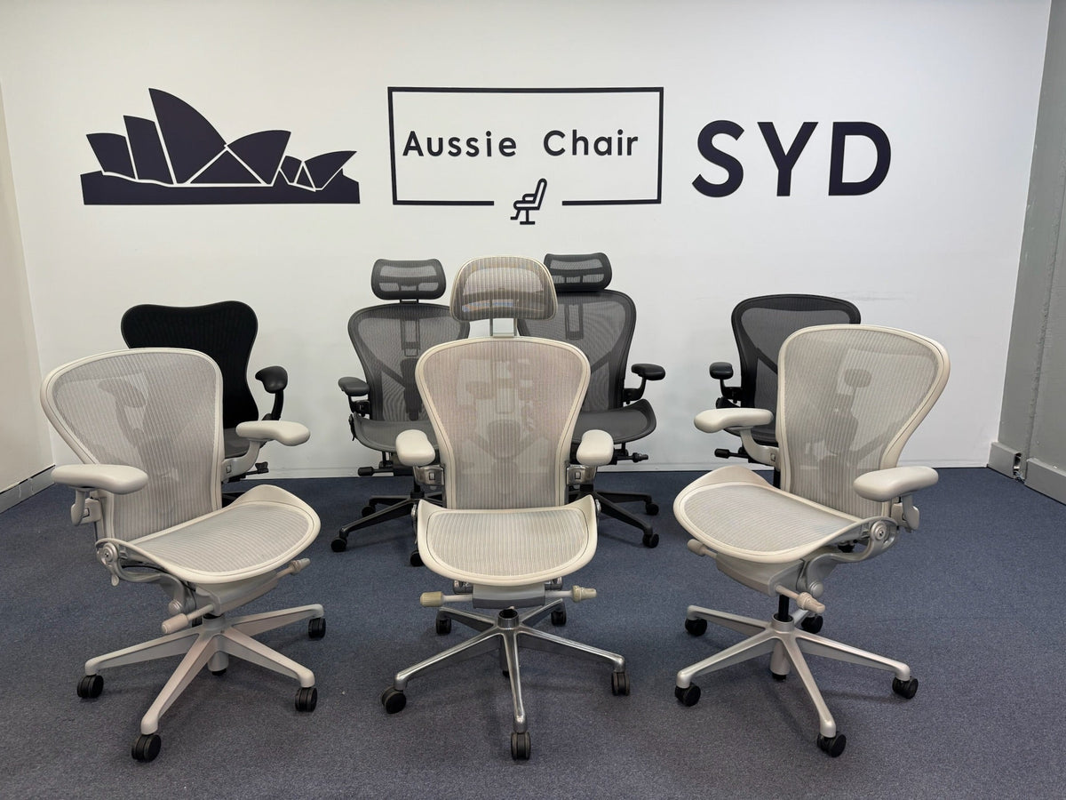 Three Herman Miller Aeron chairs in Mineral and Graphite on the Aussie Chair Sydney showroom floor